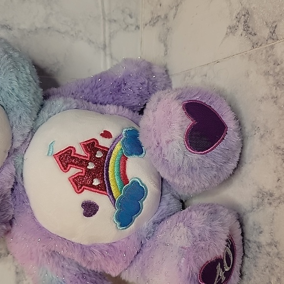 Care Bear 40th Anniversary Purple 14" Plush Stuffed Animal with Shimmer Effect - Picture 2 of 9